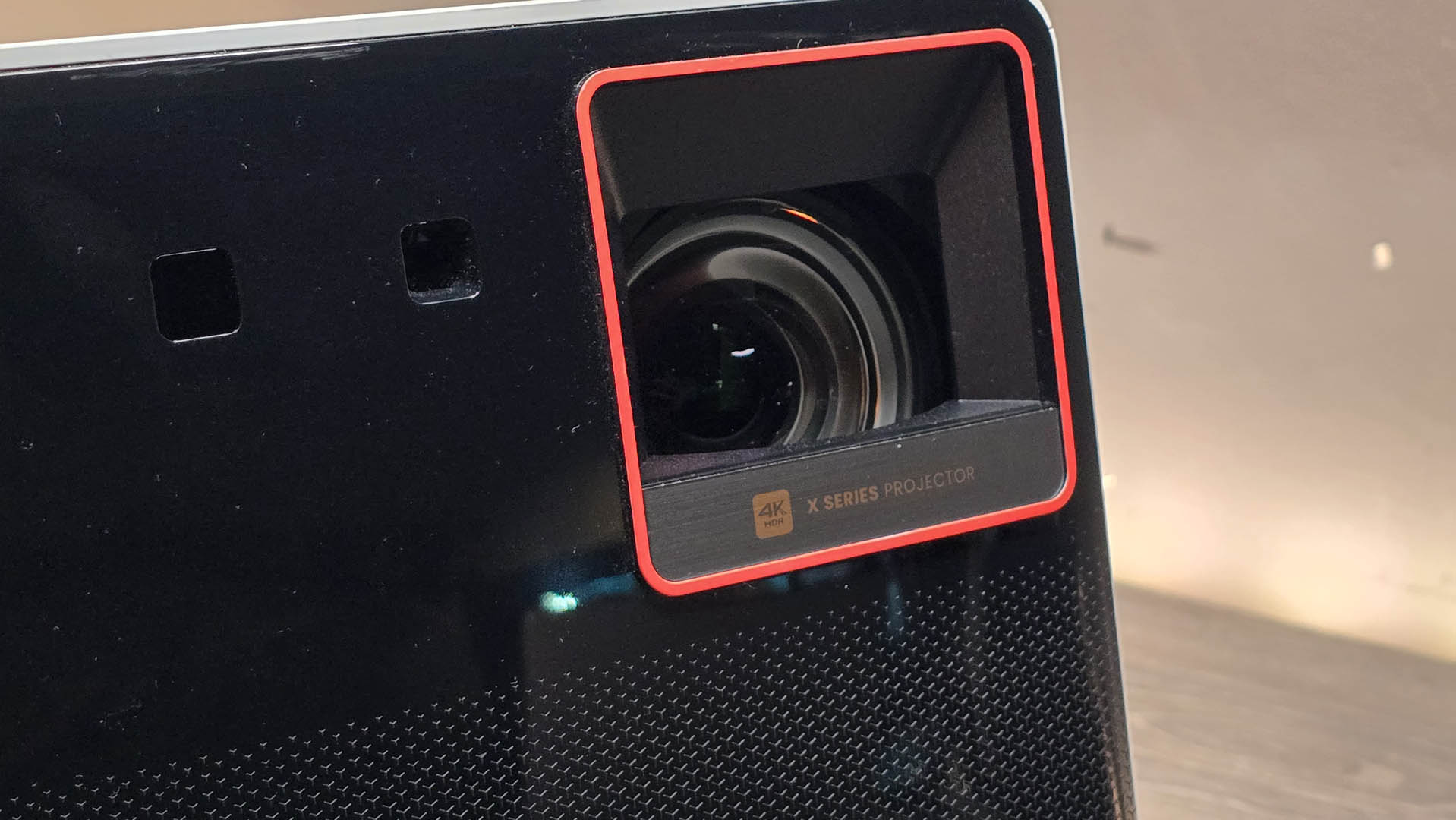 A close-up of the lens on the Benq 300G gaming projector